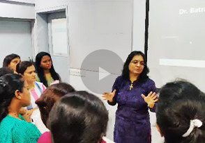 Dr Ishwari Kulkarni interacting with cosmetology batch students at the hands on training session